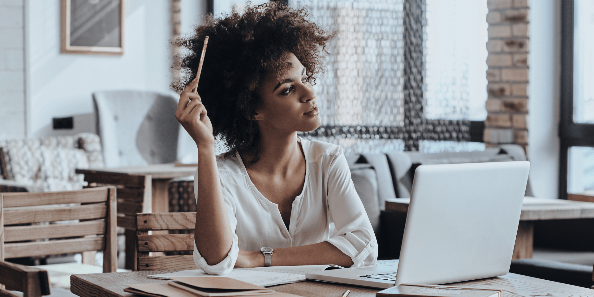 Woman hesitating over a job listing requiring data and numeracy skills